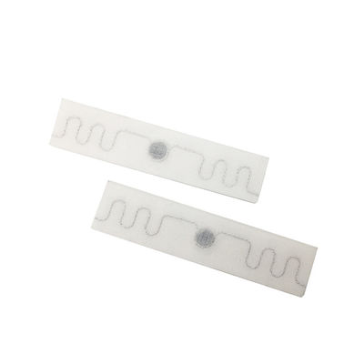 L'étiquette 20*86mm de blanchisserie de fréquence ultra-haute du tissu RFID usinent les étiquettes lavables de RFID